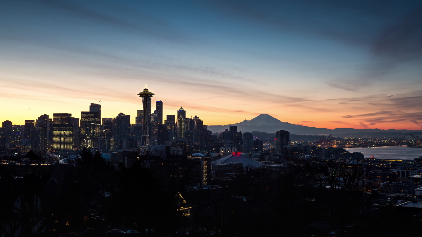 Seattle Skyline Sunrise Timelapse with Space Needle, downtown Seattle, and Mt Rainier in the background Night to Day