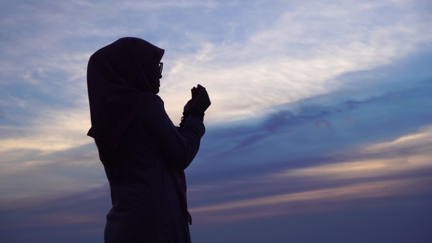 Silhouette of Female Muslim Praying Stock Footage Video (100% Royalty ...