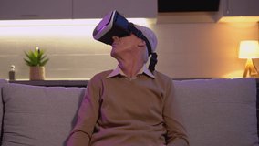 Elderly male enjoying virtual reality simulation, modern tech, entertainment