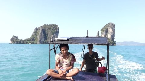 Phang Nga Bay / Thailand - August 2018: Tour guides on a boat in the Ko Yao Yai Islands in Phang Nga Bay, Thailand.