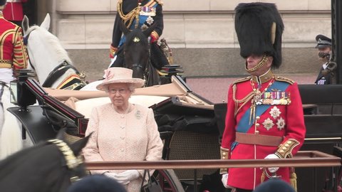 London UK June 2016. Queen Elizabeth and Duke of Edinburgh reviewing Household Cavalry at Trooping the Colour celebrations outside Buckingham Palace