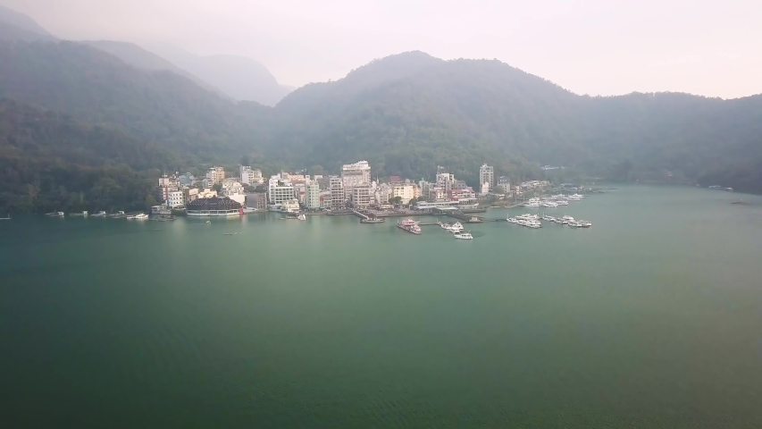 Aerial shot of Ita Thao , Sun Moon Lake, Taiwan Royalty-Free Stock Footage #1043678656