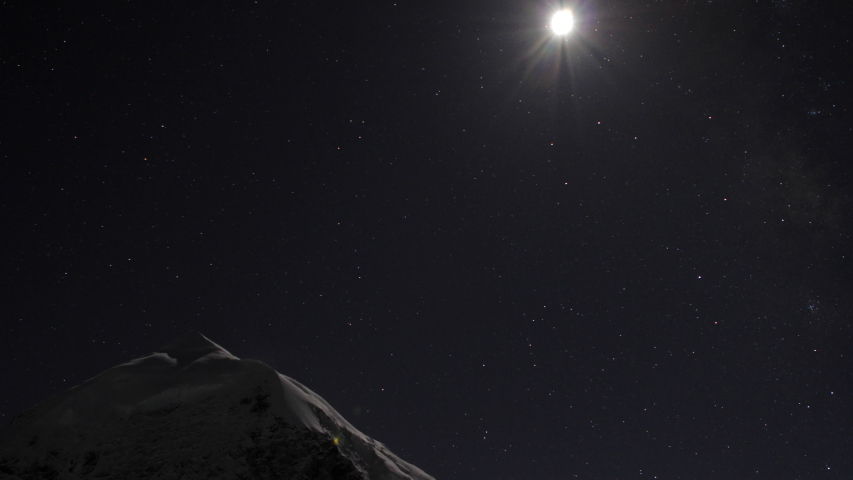 Moon rising over Himalayan peak