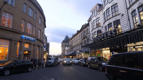 28th December, 2019, Harrogate, North Yorkshire England. Footage of a street in Harrogate with a bank and shops.