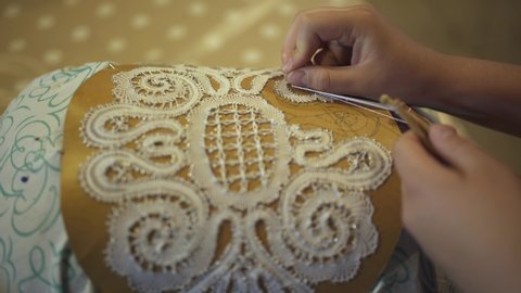 Making handmade lace close up stock video.