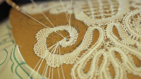 Making handmade lace close up stock video.