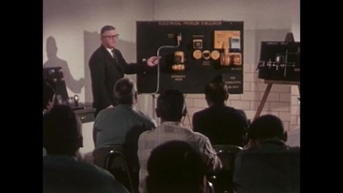 CIRCA 1963 - Workers in Rochester receive new technological training, and institutions of formal learning are shown.