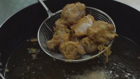 Pakora fry in the deep oil 4K and HD Stock Video Footage. Besan royalty-free stock footage