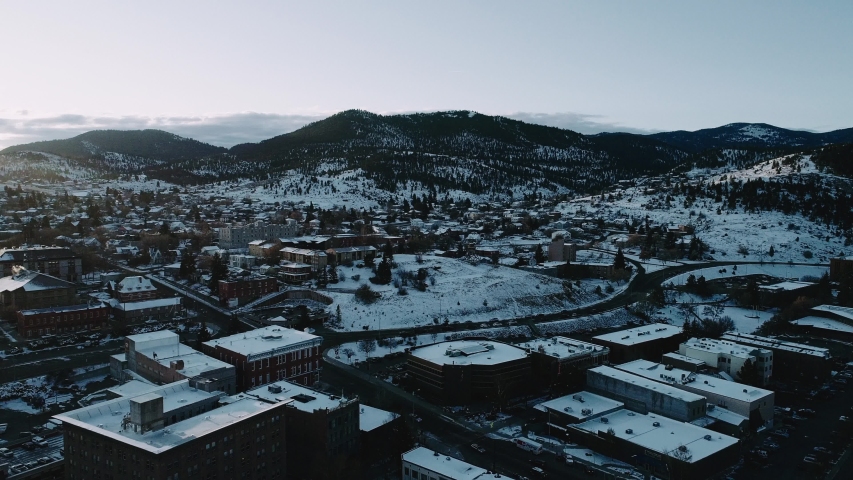 Drone shot of Helena, Montana at sunrise in the winter.