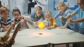 Group of School Children in Science Class Use Digital Tablet Computers with Augmented Reality Software, Looking at Educational 3D Animation Of Solar System. VFX, Special Effects Render - Powered by Shutterstock - Get 15% off with code: PIKWIZARD15