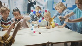 Group of School Children in Chemistry Science Class Use Digital Tablet Computers with Augmented Reality Software, Looking at Educational 3D Animation of a Molecule. VFX, Special Effects Render - Powered by Shutterstock - Get 15% off with code: PIKWIZARD15