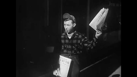 CIRCA 1950 - Newly-printed newspapers are stacked, then sold by a newsie.