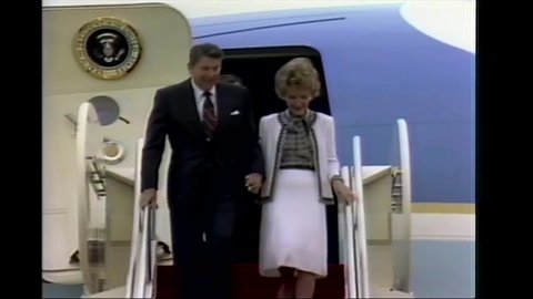 CIRCA 1982 - President Reagan and the First Lady are greeted by American officials at Andrews Air Force Base after their visit to Europe.