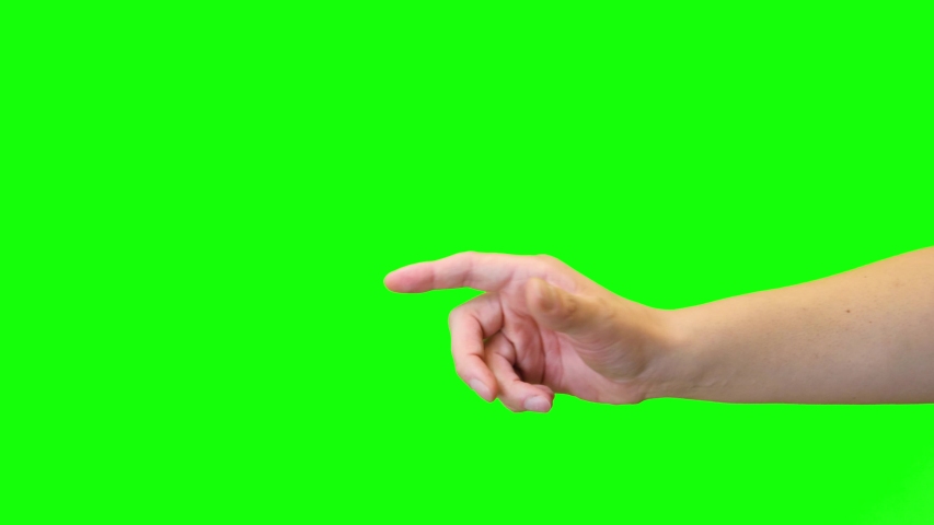 Hand enter and exit Green Screen Chroma key Grabbing with two fingers | Shutterstock HD Video #1043795401