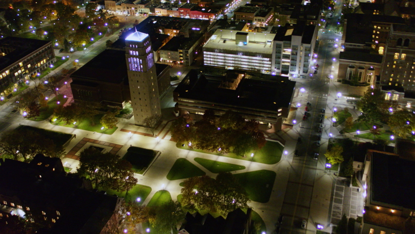 Ann Arbor Michigan Aerial Panning birdseye detail over Ingalls Hall at night - October 2017