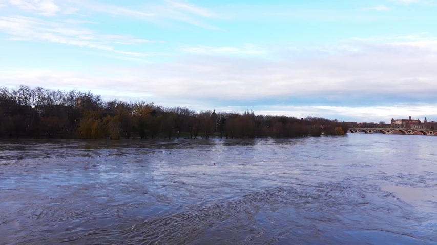 View of the flooded park with a river crowded from heavy rains in the city Toulouse, France.