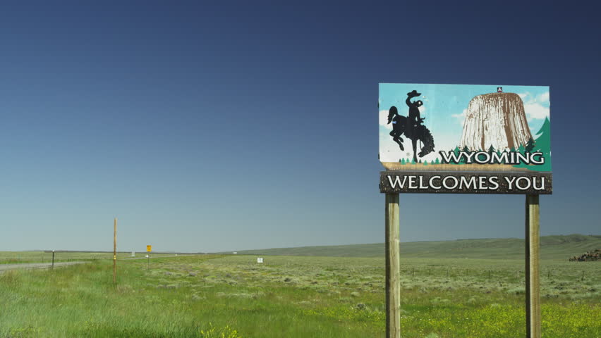 Wyoming State Border Sign on Highway 25