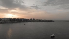 Aerial drone video from Malta, showing Qawra and Bugibba towns at sunset. MMXIX.VI.XI.