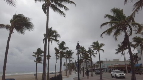 Ft Lauderdale, Florida - November, 2019:  The beach, sidewalk and street are nearly deserted as a coastal storm results in an evacuation of the town