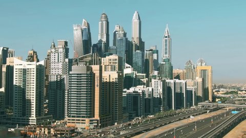 DUBAI, UNITED ARAB EMIRATES - DECEMBER 26, 2019. Aerial shot of Dubai Marina skyscrapers and Sheikh Zayed road, a major city street