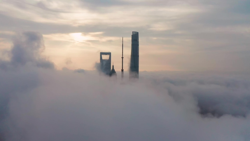 Shanghai in fog haze , aerial view of misty lujiazui skyline in cloudy