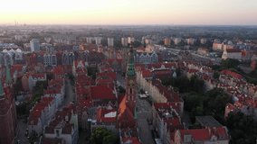 Gdansk old city in the rays of the rising sun, top view of the old city streets. 4K video