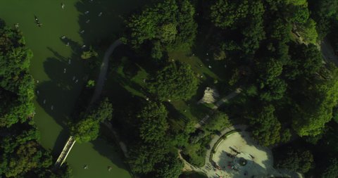 Aerial top down view of Central Park Manhattan in New York during the day under blue skies. Wide shot on 4K RED camera.