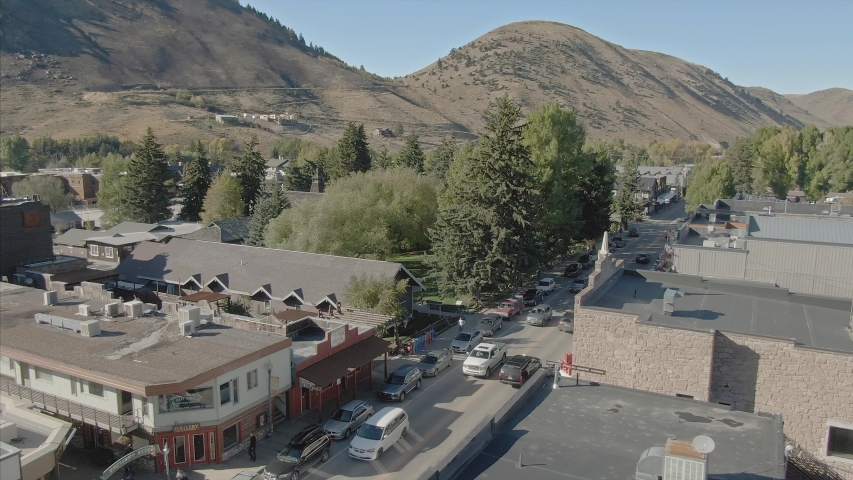 Aerial flying over the city and ski town of Jackson in Jackson Hole Valley, Wyoming, USA. 3 October 2019 