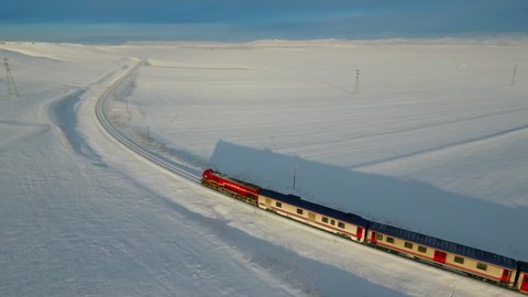 Aerial shot of Eastern Express at a snowy place.