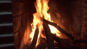 Logs of wood burning in a fireplace. Winter concept - Powered by Shutterstock - Get 15% off with code: PIKWIZARD15