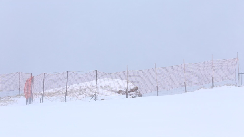 Snow falling down in winter season.
