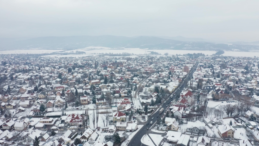 Pilisvorosvar, Hungary aerial view in winter stock video. 