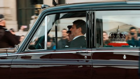 LONDON, circa 2019 - Slow motion shot of the State Limousine carrying the Royal Crown in Westminster, London, England, UK
