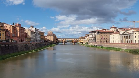 Hyperlapse of Ponte Vecchio, medieval stone bridge over of Arno river at clear summer day in Florence, Italy.