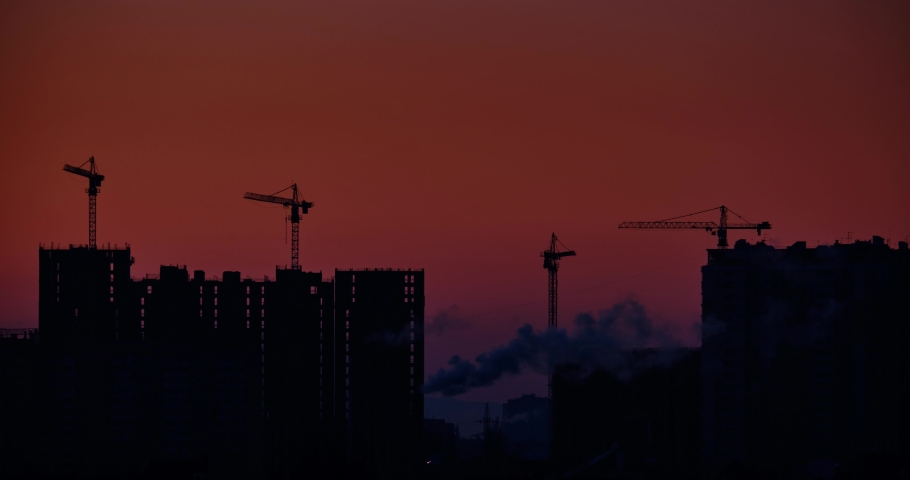 timelapse with a view of multi-storey residential buildings at dawn