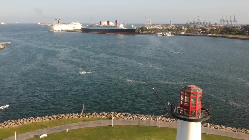 Lake Tahoe, CA. Shadow of pine trees over water. Shot from high altitude with a drone aiming downward.
