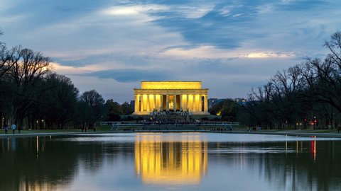 4K UHD Time lapse day to night of Abraham Lincoln Memorial in Washington, D.C. United states. Tourist attraction, us tourism, or American city lifestlye concept. Landmark and historical for travel.