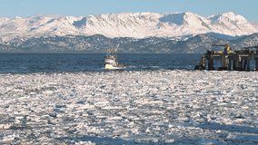 video of alaskan boat approaching harbor