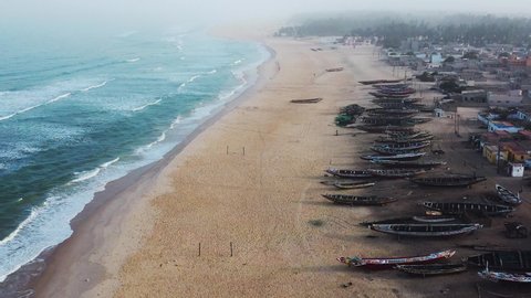 Aerial view of fishing village, pirogues fishing boats in Kayar, Senegal. Photo made by drone from above. Africa Landscapes.