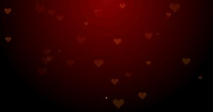 Beautiful golden heart symbol from golden glitter particles cloud on red gradient background with flying hearts for Valentines Day. Loopable 4k video