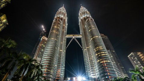 Night Cityscape. Kuala Lumpur, Malaysia - The Petronas Twin Towers against blue sky on May 10, 2018, The world's tallest Twin Towers.