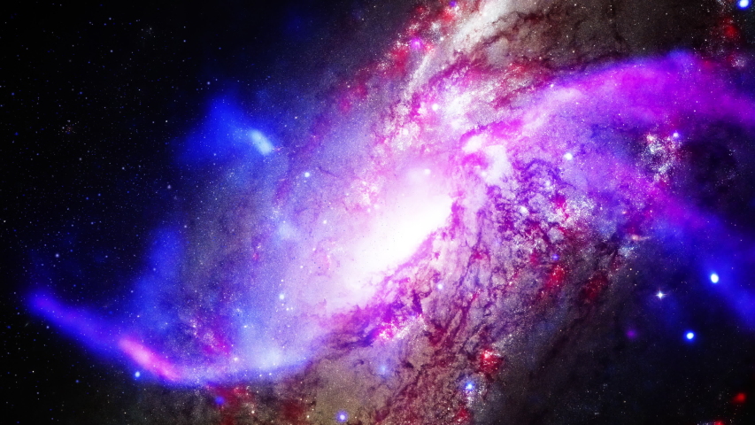 Bright galaxy heart with infinite number of flying stars falling in the center. Contains elements furnished by Nasa