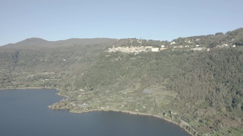 aerial view of the medieval town of Nemi with the homonymous lake. Rome Latium Italy. video not edited. color dlog-m.