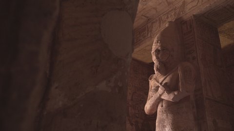 Shot of a big statue of Osiris in the interior of Abu Simbel.