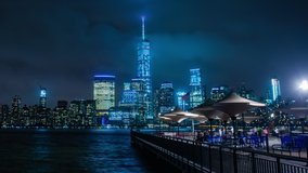 Time Lapse of New York City skyline and Hudson River at night, view from restaurant.