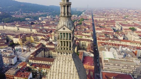 Turin, Italy. Flight over the city. Mole Antonelliana - a 19th-century building with a 121 m high dome and a spire, Aerial View, Point of interest