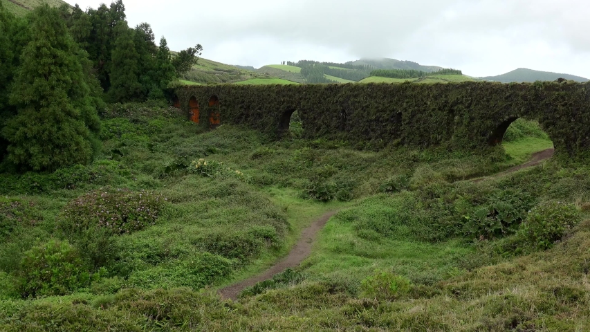 Old Aqueduct in the countryside of Sao Miguel Island. Azores, Portugal.    