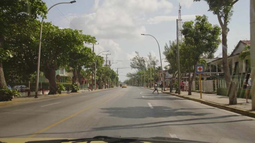 Main street from a car in Varadero, Cuba, West Indies, Caribbean, Central America