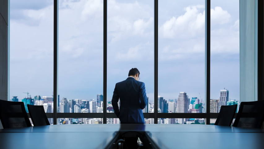 Businessman talking on the phone for negotiating business.