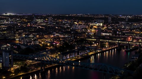 Aerial View Shot of Newcastle upon Tyne UK at night evening England north Great Britain